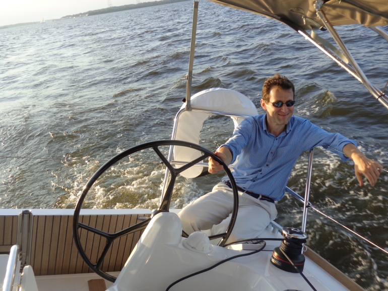 Mr. Frederic Gillier, head of the Jeanneau IT program, compently  drives the Sun Odyssey 349 to windward across the Chesapeake Bay